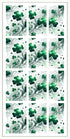 Set of green shamrock designs on a white background